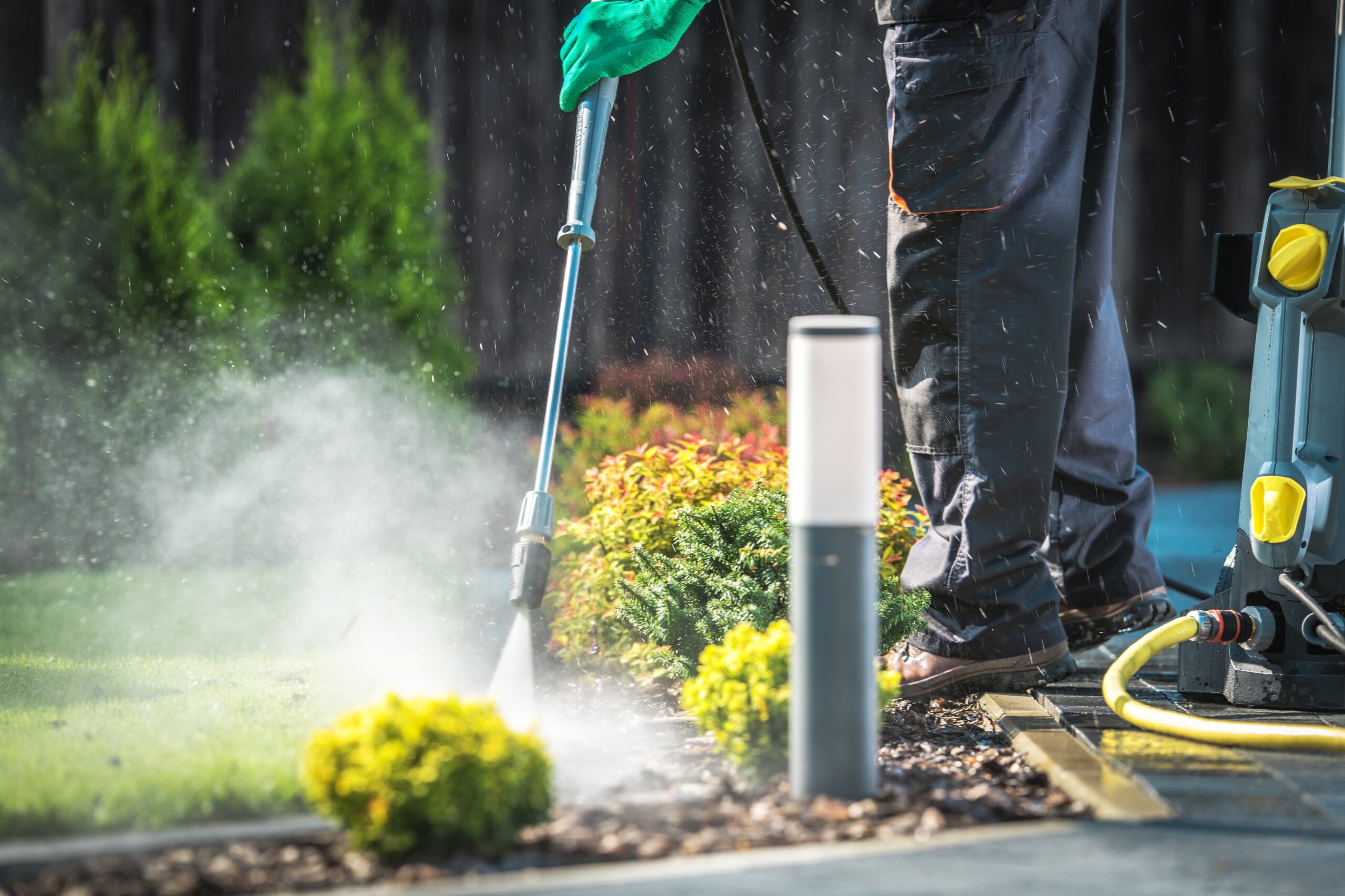 Backyard Garden Paths Cleaning with Pressure Washer.